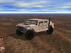 Humvee driving over rocks.